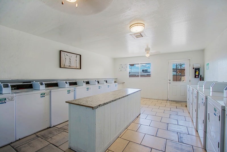 Apartment kitchen — representative home at Aire Libre Apartment Homes.